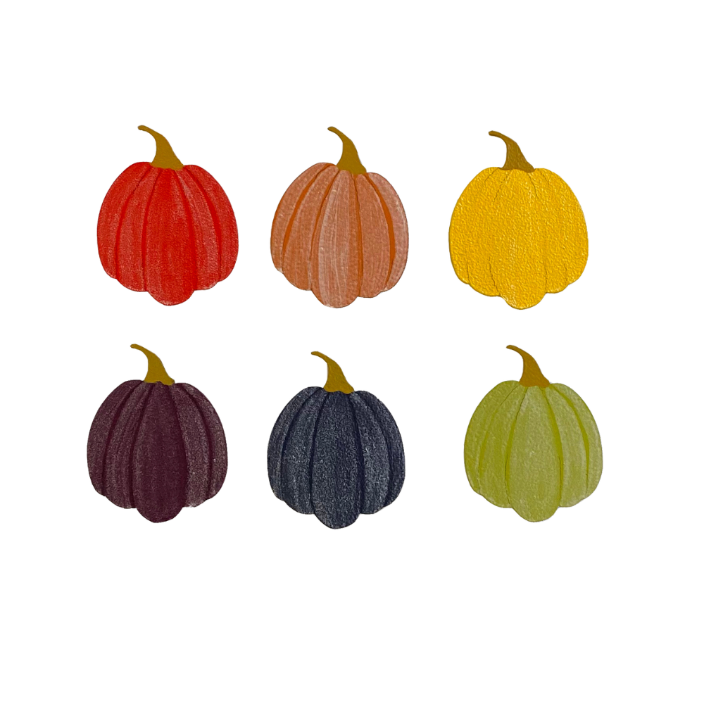 Six multi coloured pumpkin magnets on a transparent background