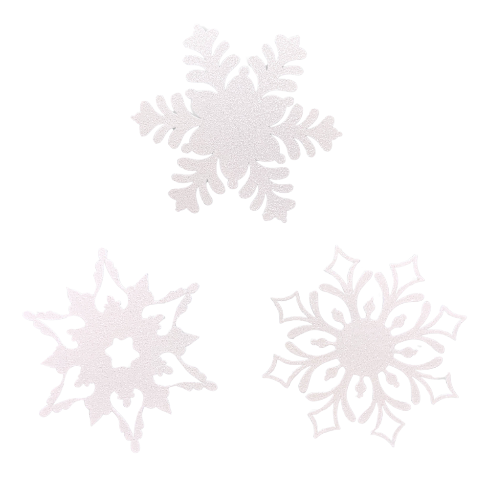 Three snowflake magnets on a transparent background. 