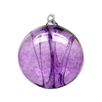 Purple glass orb with webbing pulled from bottom to top on a transparent background.