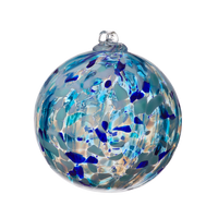 Dark blue, light blue and white glass orb on a transparent background